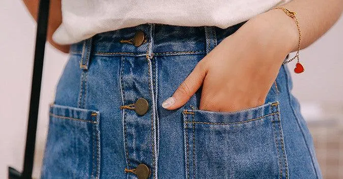 A  DENIM BUTTON-UP MINI